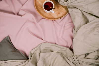 High angle view of stuffed toy on bed