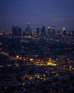 Illuminated cityscape at night