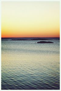 Scenic view of sea at sunset