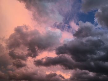 Low angle view of clouds in sky during sunset