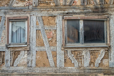 Low angle view of window on old building