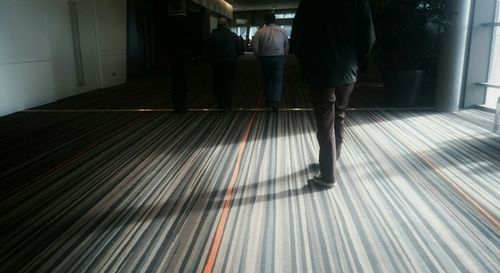 Woman standing in corridor