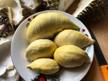 High angle view of fruits in plate on table