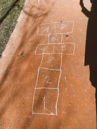 High angle view of hopscotch on footpath