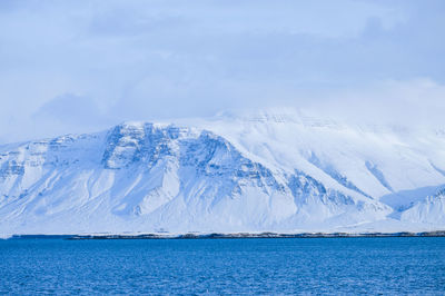 Scenic view of frozen sea against sky