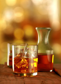 Close-up of wine in glass on table