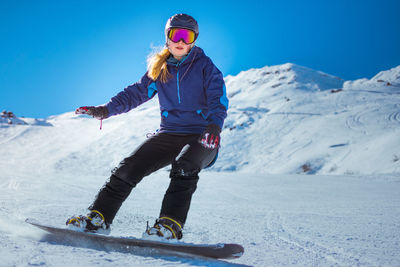 Full length of man on snowcapped mountain