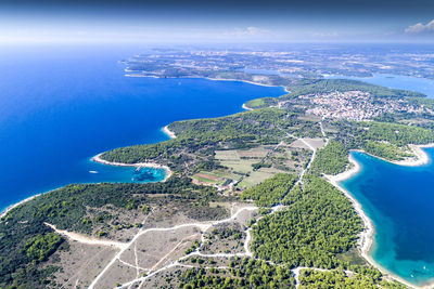 Aerial view of sea seen through airplane window