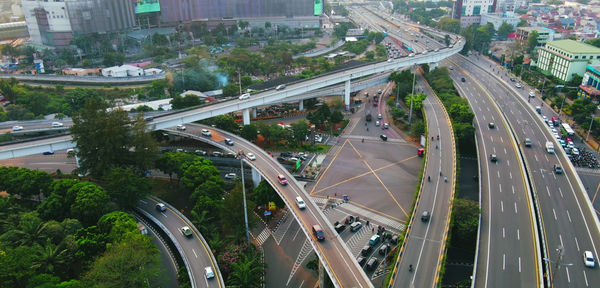 High angle view of vehicles on road in city