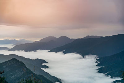 Scenic view of mountains against sky during sunset