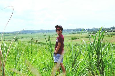 Full length of man on field against sky