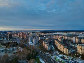 High angle view of buildings against sky in city