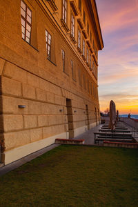 Building against sky during sunset