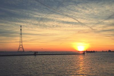 Scenic view of sea at sunset