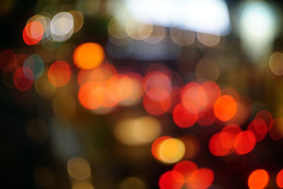 Defocused image of illuminated lights at night