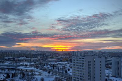 High angle view of cityscape against sky during sunset