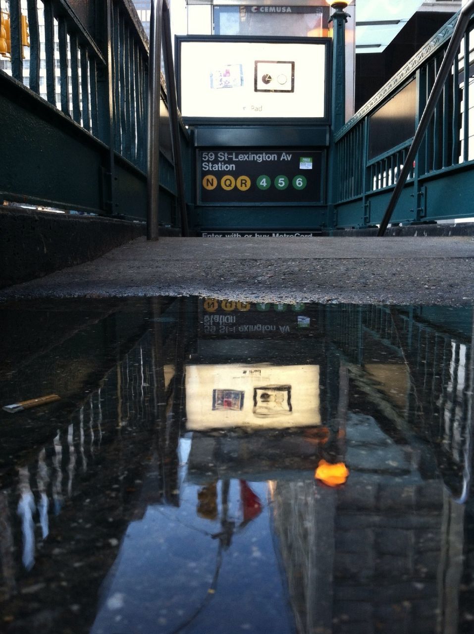 REFLECTION OF BUILDINGS IN WATER