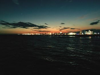 View of calm sea at dusk