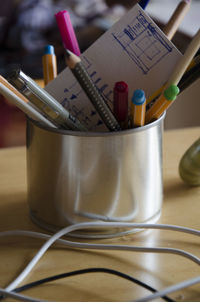 Close-up of colored pencils on table