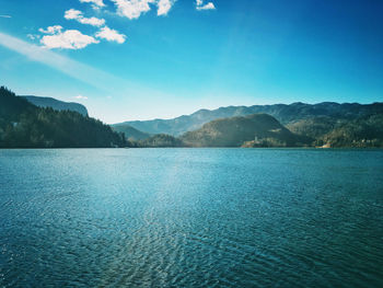 Scenic view of sea against blue sky