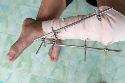 Low section of man with bandages in hospital