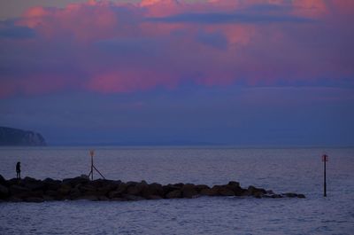 Scenic view of sea at sunset