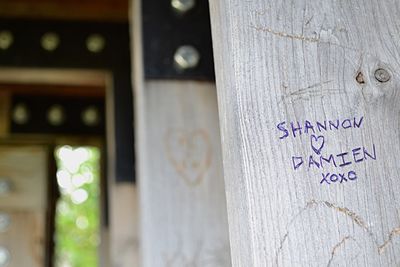 Close-up of text on wood