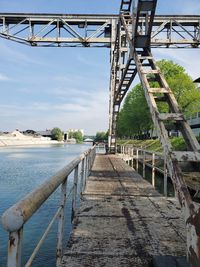 Bridge over river against sky