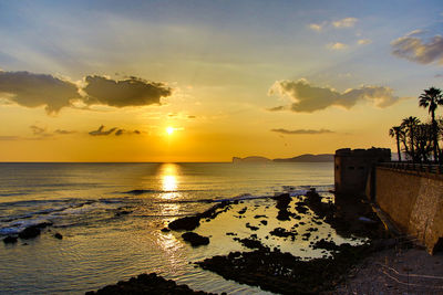 View of calm sea at sunset