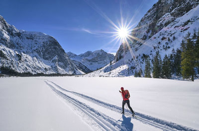 Austria, tirol, riss valley, karwendel, cross country skier in winter landscape