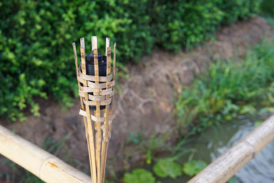 High angle view of wooden post on field