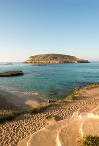 View of beach against clear sky