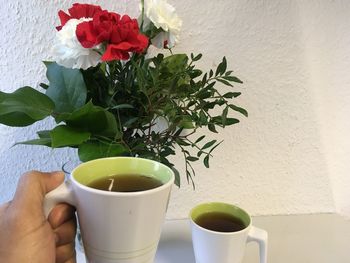 Close-up of tea cup on wall