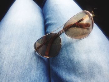 Close-up of sunglasses on table