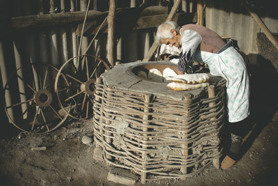 Man working in basket
