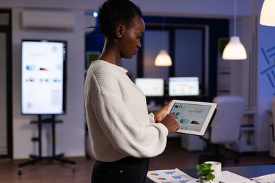 Woman working late in office