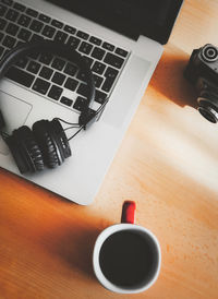 High angle view of coffee cup on table