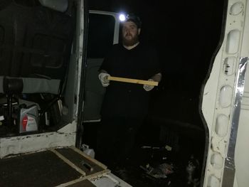 Portrait of man working in bus