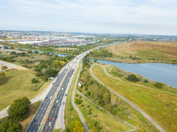 High angle view of road by sea against sky