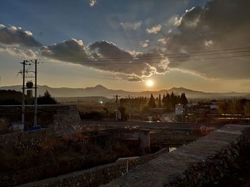 Scenic view of mountains against sky during sunset