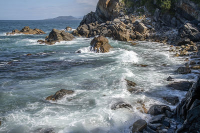 Scenic view of rocks in sea