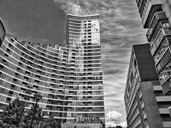 Low angle view of modern buildings against sky