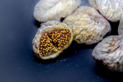 Close-up of dried fig fruits on table