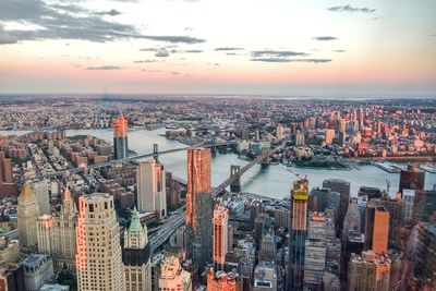 Aerial view of city at sunset