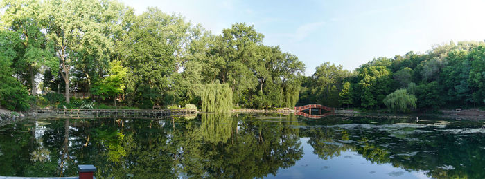 Panorama of the bridges in the garden with reflections on the water