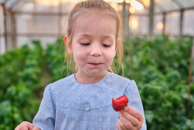 Portrait of boy eating