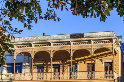 Low angle view of building against blue sky