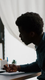 Young man looking at camera