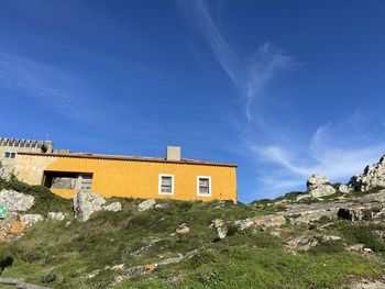 Yellow house on the hill