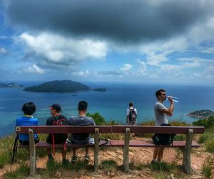 Scenic view of calm sea against cloudy sky